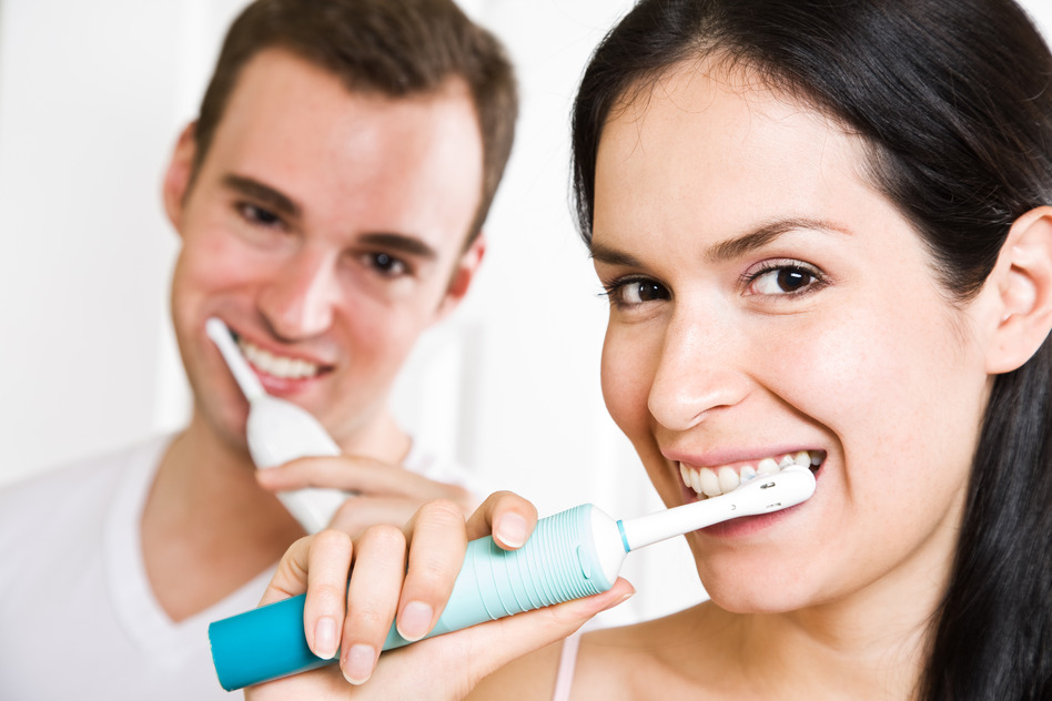 photodune-2047554-couple-brushing-teeth-in-the-bathroom-s.jpg